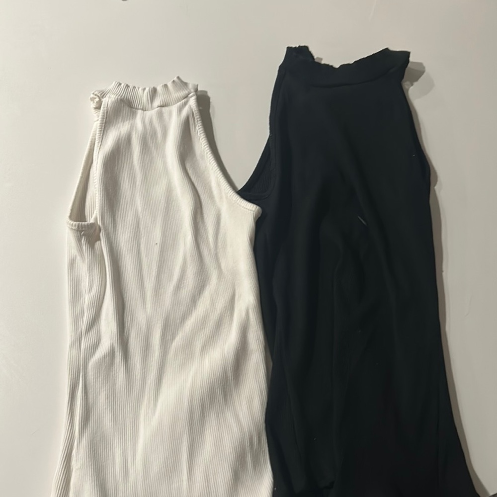 2 high neck bodysuits! Size medium. Great quality!